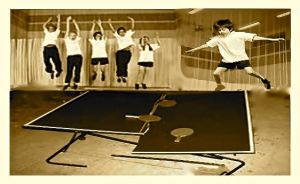 boys jumping on broken pin pong table