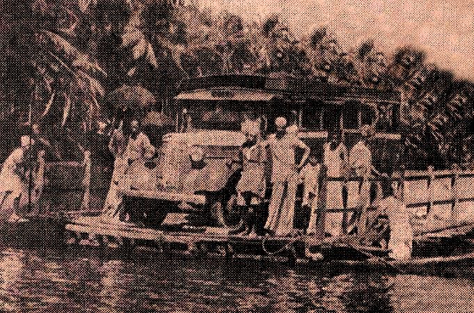 Bus on wooden ferry